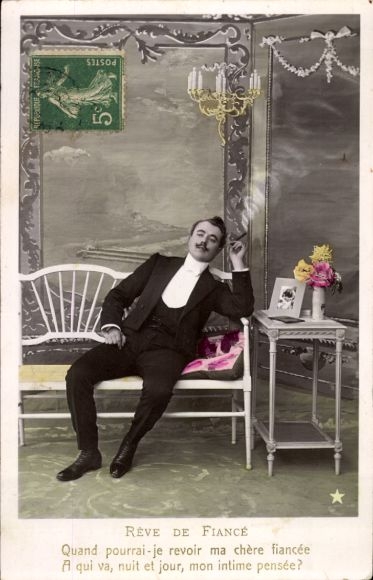 Postcard Reve De Fiancé, man in a suit sitting smoking on a bench
