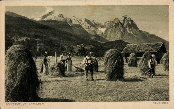 Postcard Garmisch Partenkirchen in Upper Bavaria, hay harvest, traditional costumes, Alps