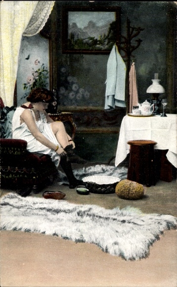 Postcard woman putting on underwear, stockings, armchair, carpet