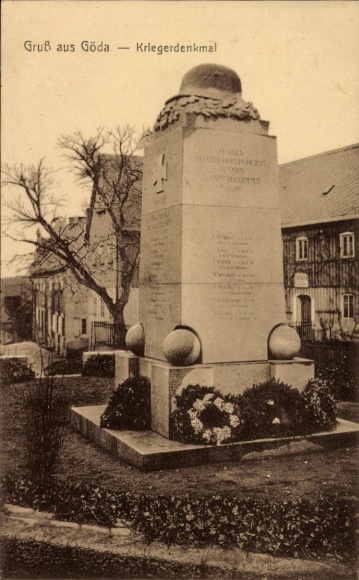 Ak Göda in Oberlausitz, oorlogsmonument, groet van bloemen, monument
