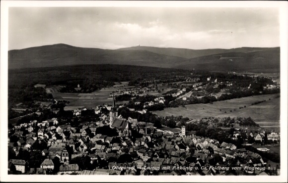Postcard Oberursel in the Hochtaunuskreis Hessen, aerial photograph of the town with Altkönig and Großer Feldberg