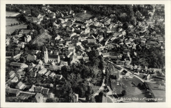 Postcard Bad Aibling in Upper Bavaria, aerial view of many houses, church, rural surroundings
