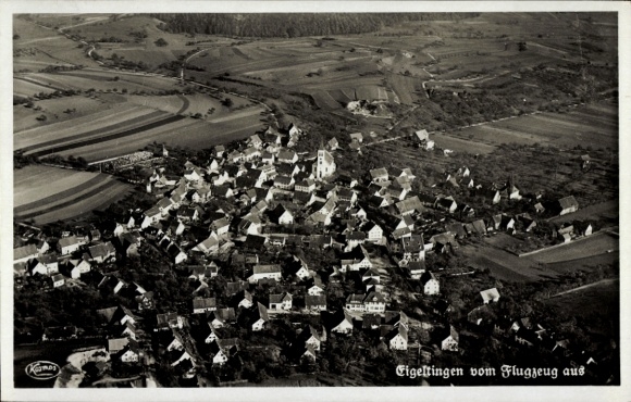 Ak Eigeltingen im Hegau Baden, Luftaufnahme von  sichtbar sind zahlreiche Häuser und Felder