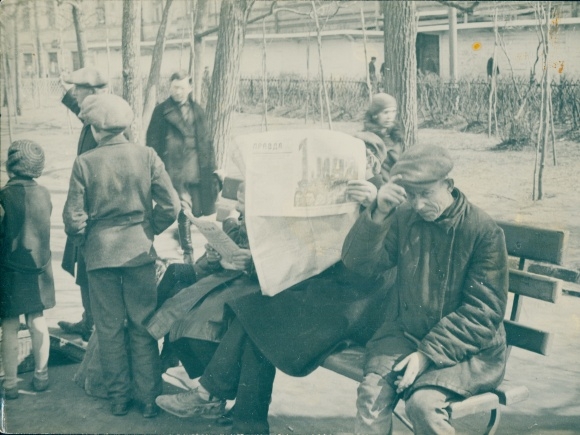 Photo Moscow Russia, May 1st, Holiday of the Proletariat, men on bench, newspaper, children