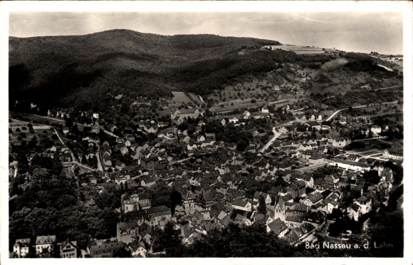 Postcard Bad Nassau an der Lahn, aerial view of the city, many houses, green hills, black and white