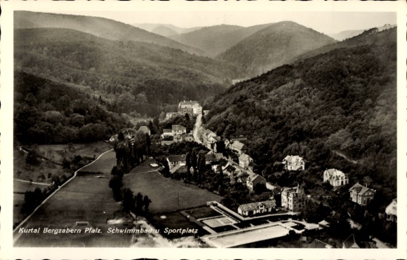 Postcard Bad Bergzabern on the Palatinate Wine Route, landscape view of houses, swimming pool, sports field
