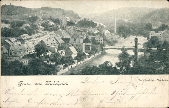 Picture of Waldheim in Saxony, view of houses, river, bridge, mountains in the background