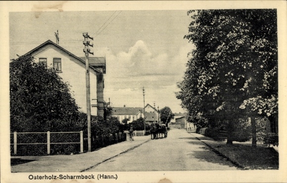 Ansichtkaart Osterholz Scharmbeck in Nedersaksen, straatbeeld met paardenkar