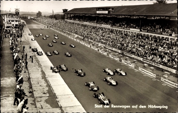 Postcard Nürburg in the Eifel, Nürburgring, start of the racing cars, large crowd, grandstand, cars