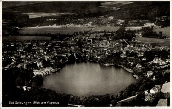 Postcard Bad Salzungen in Thuringia, aerial view of lake in the middle, idyllic landscape