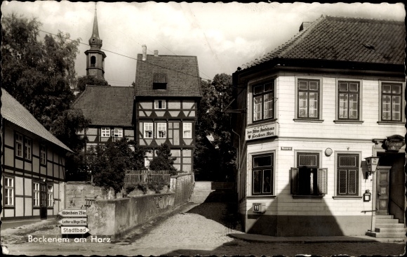Postcard Bockenem in Lower Saxony, partial view of the town, half-timbered house, Hotel zum Alten Amtshaus, signpost
