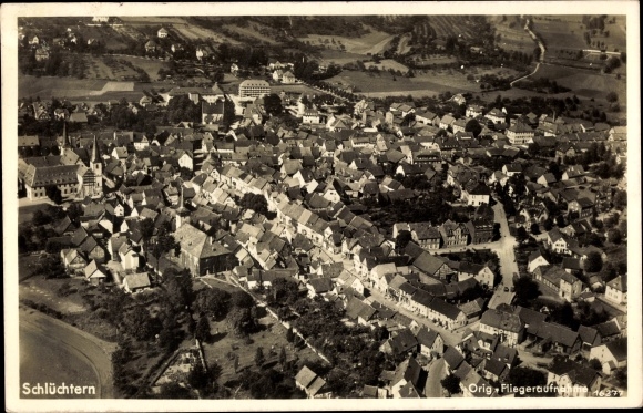 Postcard Schluechtern in Hesse, aerial photo of the place