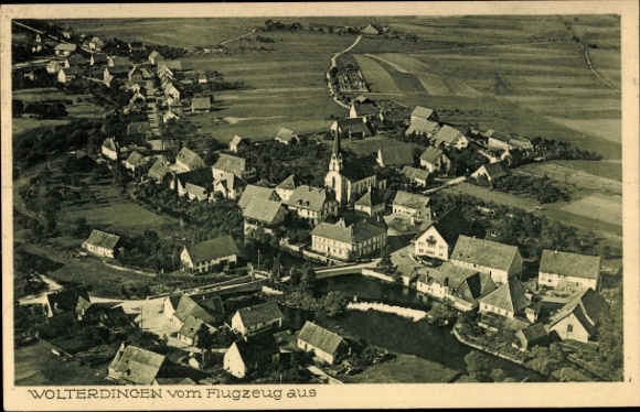 Ak Wolterdingen Soltau Lüneburger Heide, Luftbild von  Häuser, Kirche, Felder
