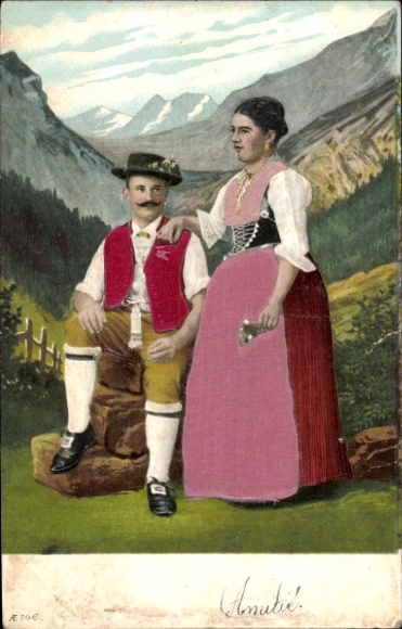 Ak Hoflössnitz Hoflößnitz Radebeul Sachsen, Mann und Frau in Tracht vor Bergkulisse.