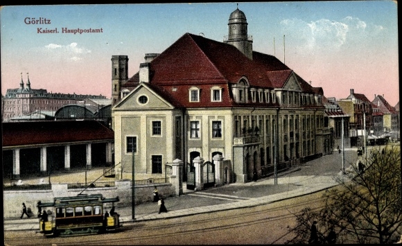 Postcard Görlitz in der Lausitz, Imperial main post office at the train station, tram