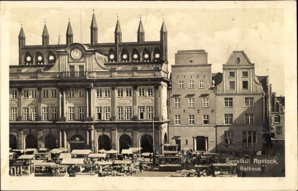 Ak Hansestadt Rostock, Rathaus von  Stadtszenario, Marktstände