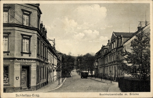 Ak Schlettau in het Ertsgebergte, Buchholzerstraße met brug, winkel