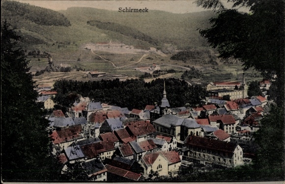 Postcard Schirmeck Alsace Bas Rhin, view of houses with red roofs, church, green landscape