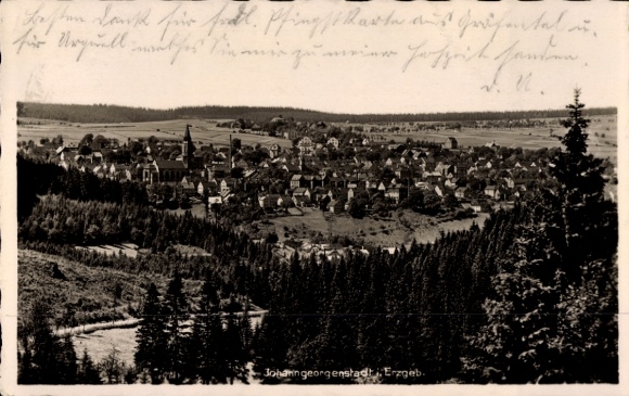 PC Johanngeorgenstadt in the Ore Mountains, black and white photo of church, houses, forests