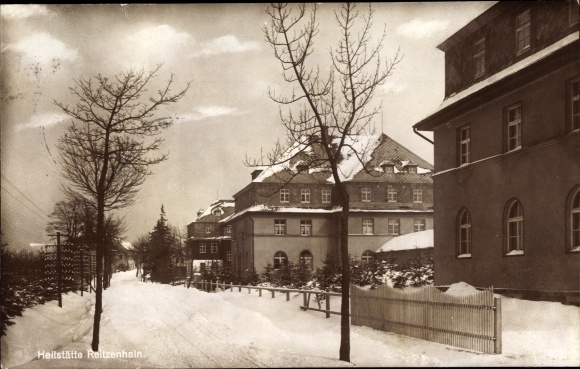 Foto Ak Reitzenhain Marienberg in het Ertsgebergte, straatgedeelte in de stad, winters uitzicht