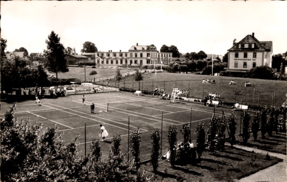 Postcard Ostseebad Dahme in Holstein, tennis court, buildings in the background, people on the meadow