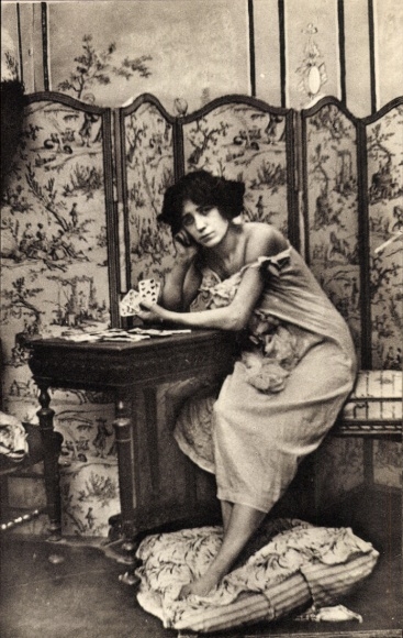 Postcard Parisiennes fin de siecle, woman in underwear, pillow, playing cards