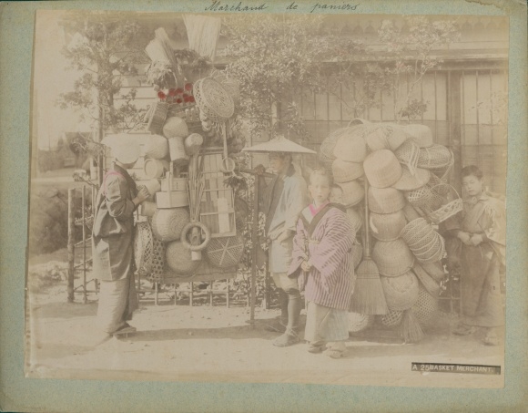 Colored photo of Japanese basket traders in traditional robes, mother and child