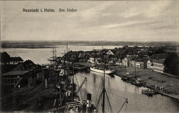PC Neustadt in Holstein, harbor view, boats, water, buildings on the shore, lettering 'Neustadt i....