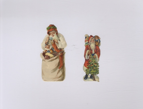 2 Oblaten Weihnachtsmänner mit Geschenken und Kinderspielzeug, ca. 10 x 5 cm und 8,5 x 3 cm