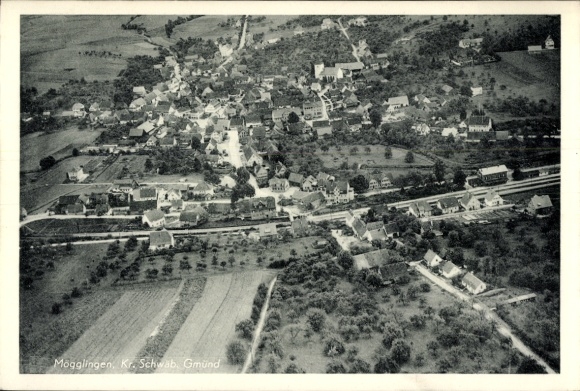 Postcard Mögglingen in the Ostalbkreis, aerial view of Schwäbisch Gmünd, several buildings, rural surroundings