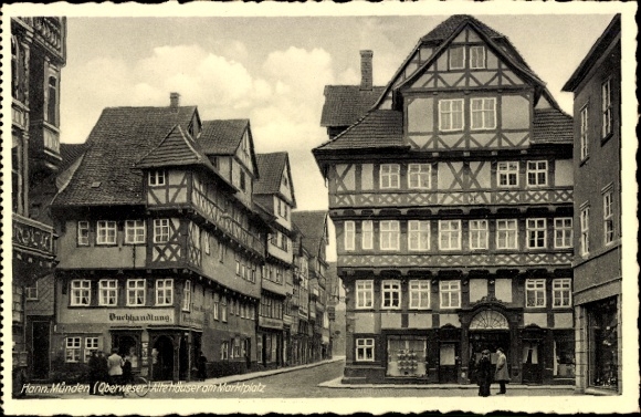 Postcard Hann. Münden in Lower Saxony, old houses, market square, bookstore