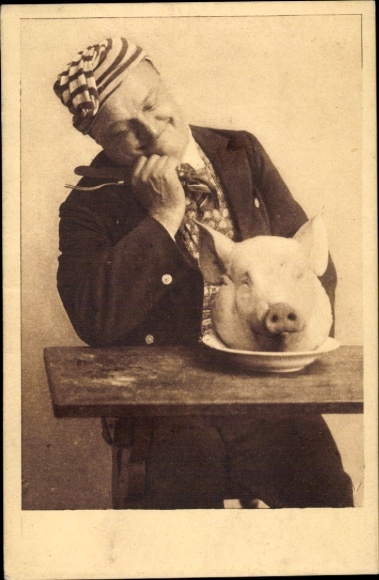 Postcard Man with Cutlery, Pig's Head