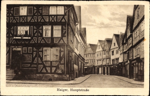 Postcard Haiger in the Lahn Dill district, main street, half-timbered house