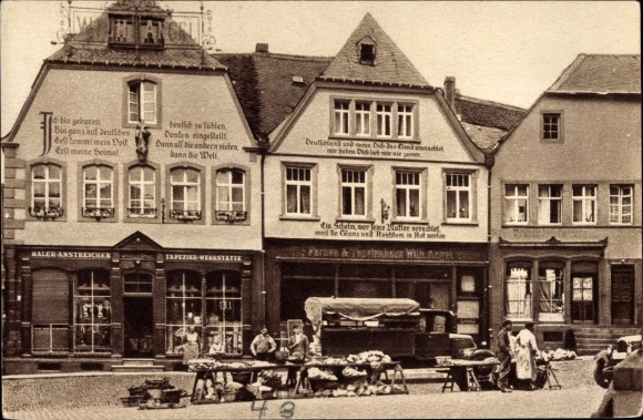 Postcard Sankt Wendel Saarland, houses with confessions on the cathedral square, market stalls