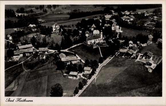 Postcard Bad Heilbrunn in Upper Bavaria, aerial view of many buildings, green landscape.