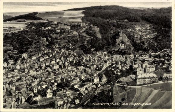 Postcard Idar Oberstein on the Nahe, aerial view of the city, airplane perspective