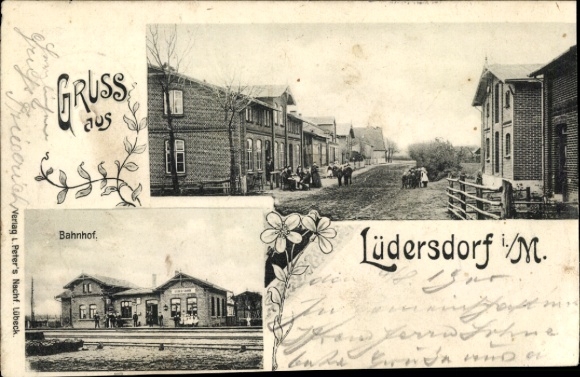 Postcard Lüdersdorf in Mecklenburg, street section, residents, train station track side