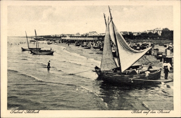 Postcard Ostseebad Ahlbeck on Usedom, seaside resort beach view, boats on the water, people on the beach
