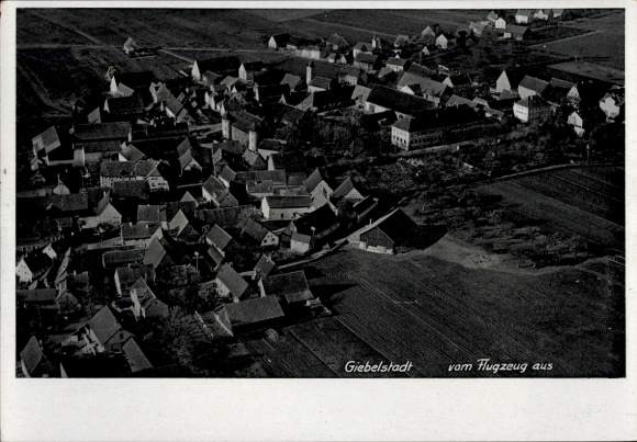 Postcard Giebelstadt in Lower Franconia, aerial view of numerous roofs, rural surroundings