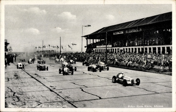 Postcard Nürburg in Rhineland Palatinate, Nürburgring, start of the racing cars, grandstand