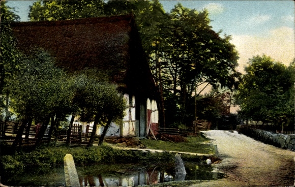 Ak Ehestorf Rosengarten Kreis Harburg, Straßenpartie mit Blick auf ein Bauernhaus mit Reetdach