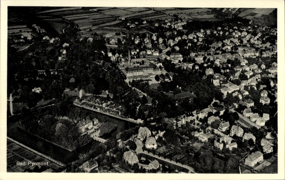 Postcard Bad Pyrmont in Lower Saxony, aerial view of diverse residential buildings and green areas