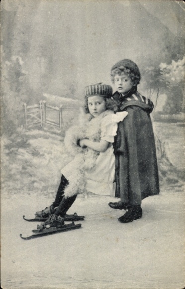 Postcard small children on skates