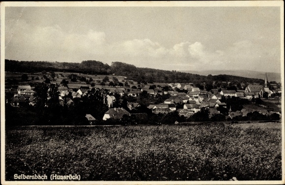 Postcard Selbersbach um Hunsrück, view over a field to the village, church, houses