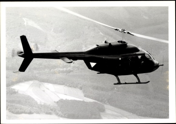 Photo Austrian military helicopter in the air, Augusta Bell