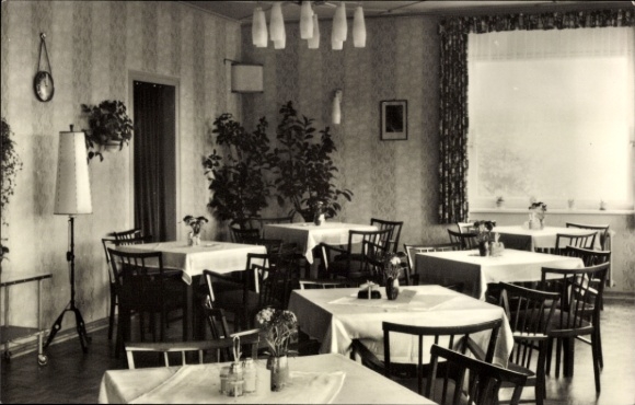 Postcard Masserberg in Thuringia, restaurant with tables, plants, windows, veranda, cozy atmosphere