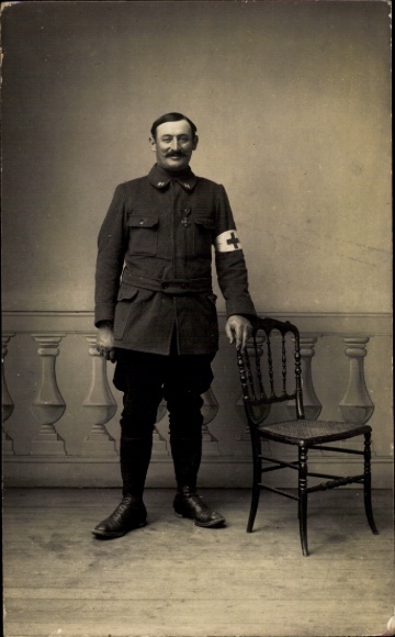 Photo Postcard French soldier in uniform, medic, portrait