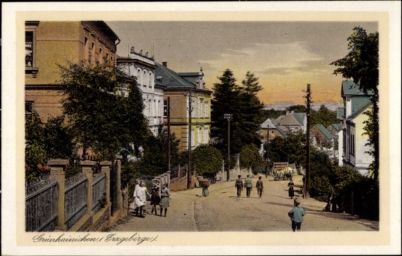 Postcard Grünhainichen in the Erzgebirge, street, passers-by