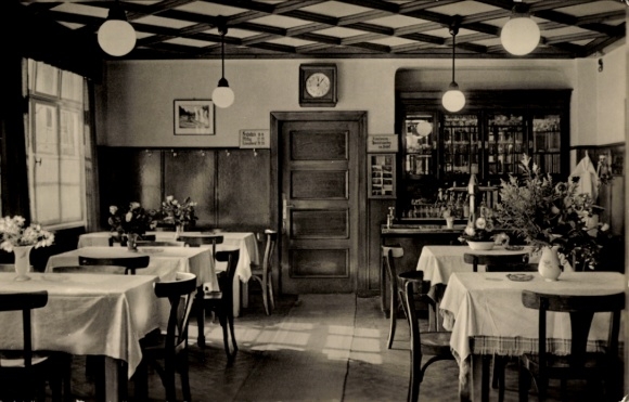 Postcard Meura in the Thuringian Forest, Gasthaus Meurasteln, tables with flowers, clock, bar, wood decor