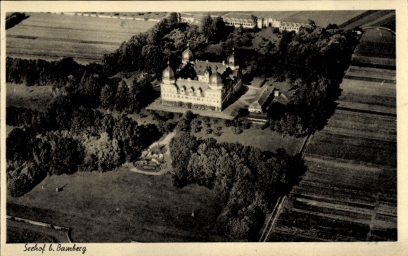 Postcard Bamberg in Upper Franconia, aerial view of Seehof Castle, surrounded by meadows and fields